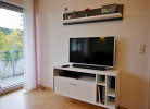 Fewo M am Kurpark - TV-Board mit BluRay player, Soundbar und guter DVD-Auswahl