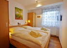 Schlafzimmer 3 mit Doppelbett (180x200) und TV - Fewo Traumblick am Sonnenlift****