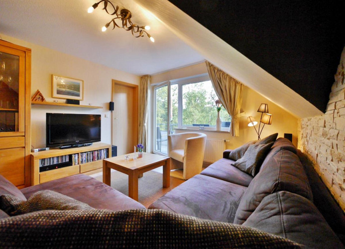 Fewo A am Kurpark - Wohnzimmer mit  Homecinema und viele DVD/Cds