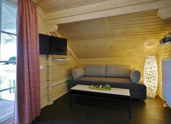 Ferienblockhaus Wohn/Schlafzimmer mit Schlafcouch OG